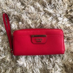 A Guess wristlet
